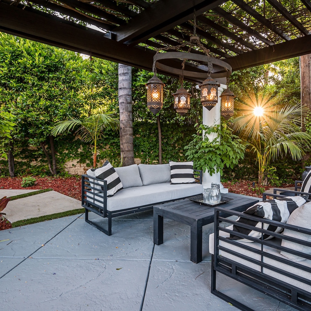patio-with-white-couches-and-chairs-in-a-modern-ne-2025-02-01-18-52-50-utc