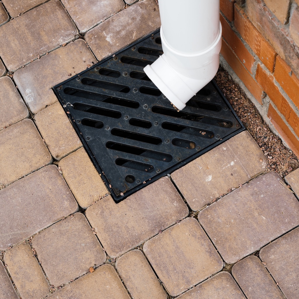 stormwater-cast-iron-drainage-system-in-a-pavement-2025-01-08-03-05-43-utc