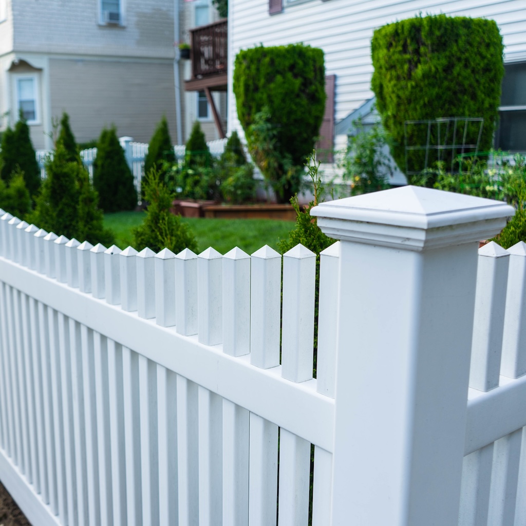 white-picket-fence-residential-neighborhood-houses-2024-10-17-14-40-36-utc